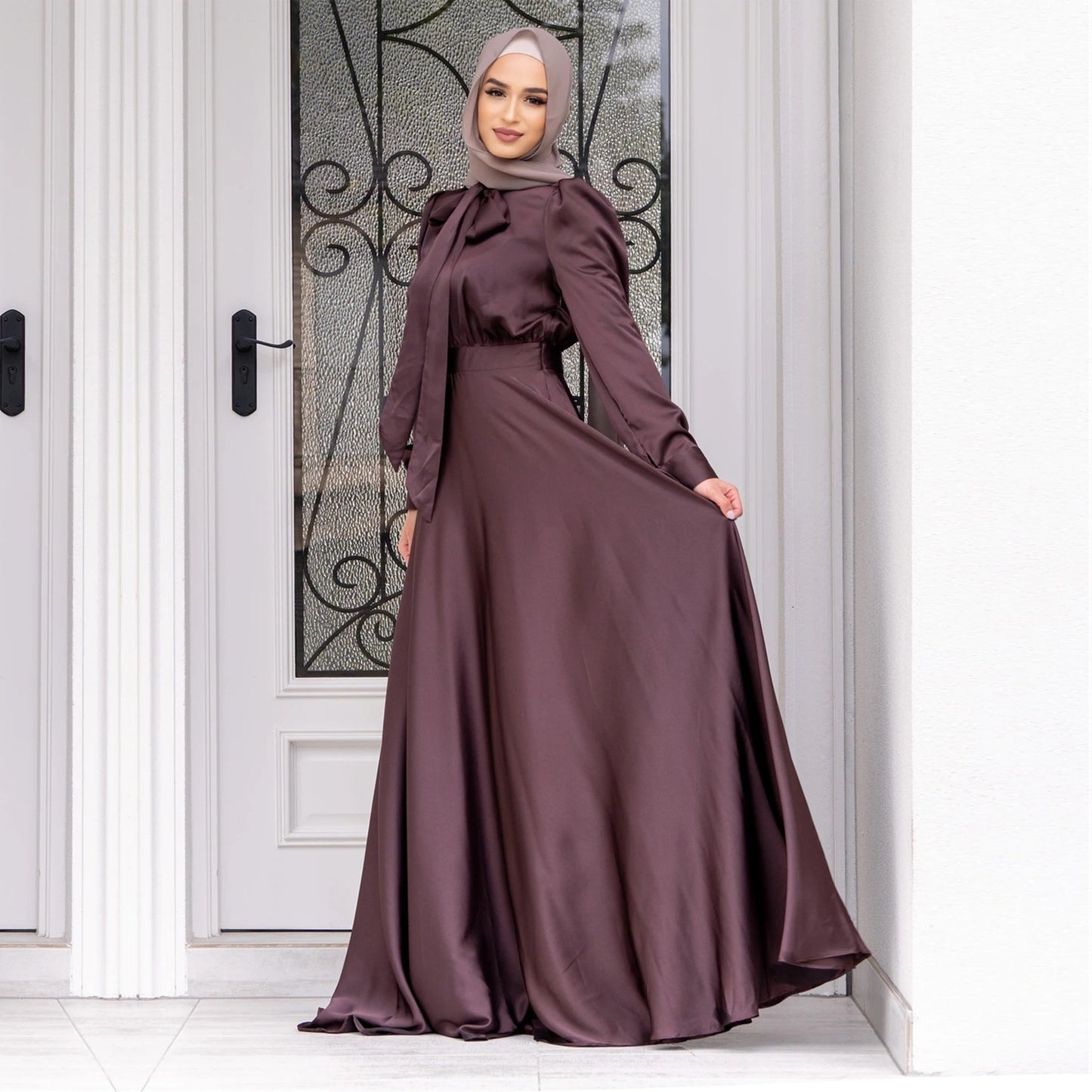 Elegant long sleeve satin dress for formal occasions